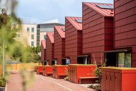 BDP turns disused garages into social housing in Bristol Image