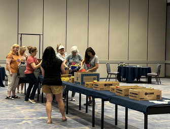 World Vision and FGIA Partner to Fill Backpacks for Local Children Image