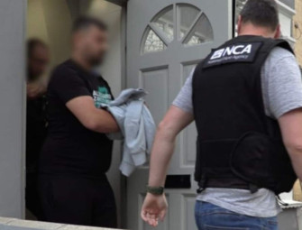 Inside London raids targeting ‘people smuggling gang as four arrested Image