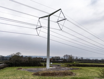 Households living near new pylons could get £250 a year off bills for a decade Image