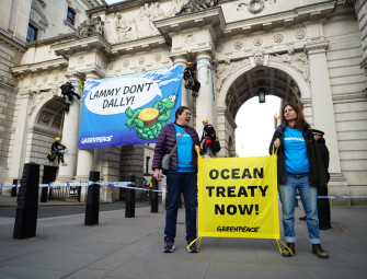 Greenpeace activists climb Foreign Office building over signing of ocean treaty Image
