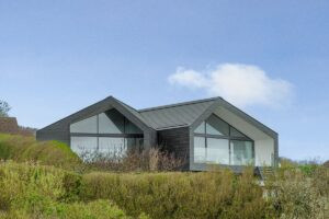 CUPACLAD® 101 random provides natural definition to two bespoke coastal properties   Image