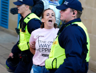 Epping migrant hotel protesters march on council offices as police make arrests Image