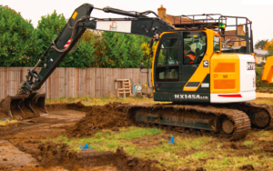 Higham Groundworks has added a third HD Hyundai excavator to its fleet Image