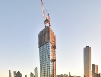 The Queensbridge Building tops out at 209 metres Image