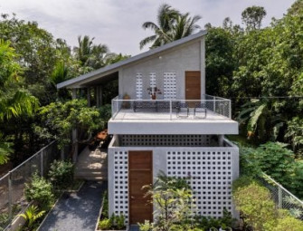 Monastic minimalism informs Vietnamese jungle home by MM++ Architects Image