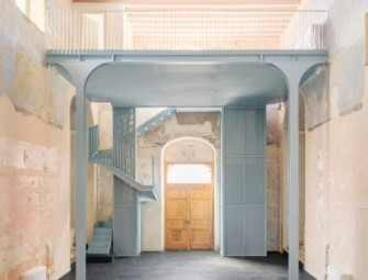 Caarpa transforms Italian church into event venue with mezzanine addition Image