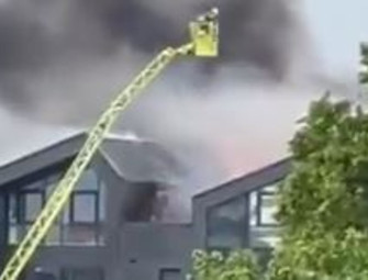 Walthamstow fire: Dozens evacuated from homes as 100 firefighters tackle huge blaze at block of flats  Image